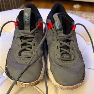 Nike Kids Gray Sneakers with Red Highlights